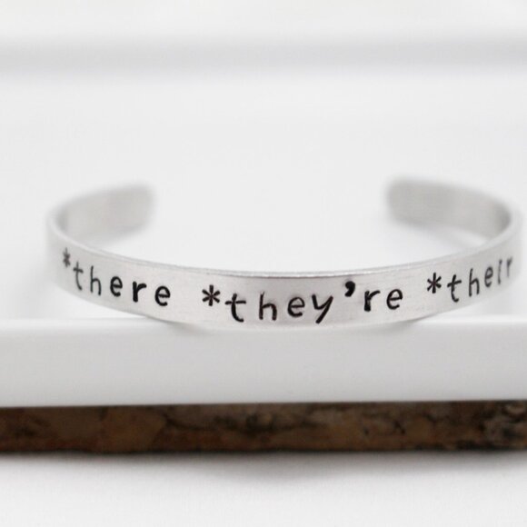 *There *They're *Their - Hand Stamped Anodized Aluminum Bangle - Adjustable - Picture 10 of 14